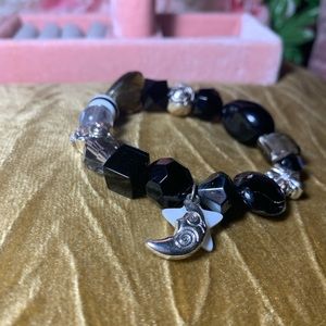 Hand beaded moon and star bracelet.